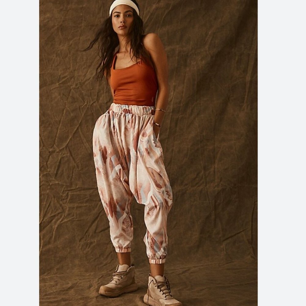 NWOT Free People Movement All Strapped One Piece Harem Jumpsuit in Orange